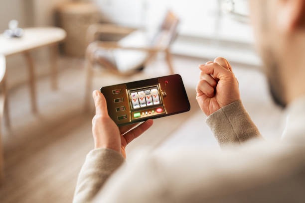 Mobile phone showing deposit payment method selection screen